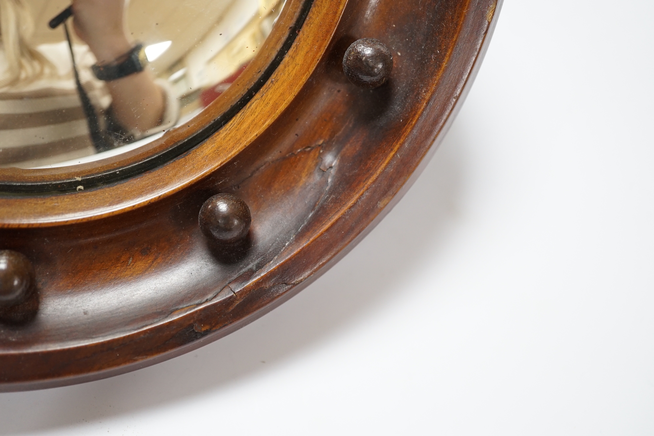 A pair and two other small convex wall mirrors, largest 23cm